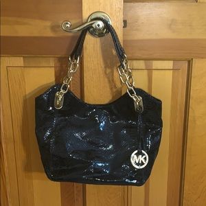 Micheal Kohrs Black Snake print hand bag